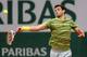 PARIS, FRANCE - MAY 27: Grigor Dimitrov of Bulgaria returns a shot during his men's singles match against Ivo Karlovic of Croatia on day three of the French Open at Roland Garros on May 27, 2014 in Paris, France. (Photo by Matthew Stockman/Getty Images)