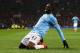 MANCHESTER, ENGLAND - MARCH 25: Yaya Toure of Manchester City celebrates scoring the third goal during the Barclays Premier League match between Manchester United and Manchester City at Old Trafford on March 25, 2014 in Manchester, England. (Photo by Al