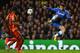 LONDON, ENGLAND - MARCH 18: Eden Hazard of Chelsea jumps for the ball as Emmanuel Eboue (L) and Aurelien Chedjou of Galatasaray look on during the UEFA Champions League Round of 16 second leg match between Chelsea and Galatasaray AS at Stamford Bridge on