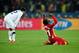 RUSTENBURG, SOUTH AFRICA - JUNE 26: Kwadwo Asamoah of Ghana celebrates victory as Benny Feilhaber of the United States looks dejected during the 2010 FIFA World Cup South Africa Round of Sixteen match between USA and Ghana at Royal Bafokeng Stadium on Jun