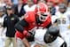 Nov 9, 2013; Athens, GA, USA; Georgia Bulldogs defensive end Ray Drew (47) sacks Appalachian State Mountaineers quarterback Kameron Bryant (5) during the second half at Sanford Stadium. Georgia defeated Appalachian State 45-6. Mandatory Credit: Dale Zanin