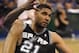 May 25, 2014; Oklahoma City, OK, USA; San Antonio Spurs forward Tim Duncan (21) reacts to a play against the Oklahoma City Thunder during the third quarter in game three of the Western Conference Finals of the 2014 NBA Playoffs at Chesapeake Energy Arena.