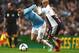 MANCHESTER, ENGLAND - MAY 07: Aleksandar Kolarov of Manchester City is challenged by Karim El Ahmadi of Aston Villa during the Barclays Premier League match between Manchester City and Aston Villa at Etihad Stadium on May 7, 2014 in Manchester, England.