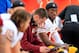 PHILADELPHIA, PA - NOVEMBER 17: Quarterback Robert Griffin III #10 of the Washington Redskins talks with offensive coordinator Kyle Shanahan (L) during the first half against the Philadelphia Eagles at Lincoln Financial Field on November 17, 2013 in Phila