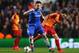 LONDON, ENGLAND - MARCH 18: Frank Lampard of Chelsea evades Selcuk Inan of Galatasaray during the UEFA Champions League Round of 16 second leg match between Chelsea and Galatasaray AS at Stamford Bridge on March 18, 2014 in London, England. (Photo by Cl