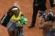 Serena Williams exits the court after her second-round loss in the 2014 French Open.