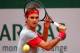 PARIS, FRANCE - MAY 28: Roger Federer of Switzerland returns a shot during his men';s singles match against Diego Sebastian Schwartzman of Argentina on day four of the French Open at Roland Garros on May 28, 2014 in Paris, France. (Photo by Clive Brunsk