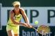 INDIAN WELLS, CA - MARCH 08: Elina Svitolina of Ukraine returns a shot to Ana Ivanovic of Serbia during the BNP Parabas Open at the Indian Wells Tennis Garden on March 8, 2014 in Indian Wells, California. (Photo by Matthew Stockman/Getty Images)