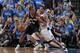 DALLAS, TX - MAY 2: Kawhi Leonard #2 of the San Antonio Spurs posts up against Devin Harris #20 of the Dallas Mavericks during Game Six of the Western Conference Quarterfinals during the 2014 NBA Playoffs on May 2, 2014 at the American Airlines Center in