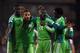 LONDON, ENGLAND - MAY 28: Uche Nwofor of Nigeria (2nd R) celebrates with team mates after equalising in the last minute during an International Friendly between Scotland and Nigeria at Craven Cottage on May 28, 2014 in London, United Kingdom. (Photo by