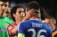 LONDON, ENGLAND - APRIL 30: Tiago of Club Atletico de Madrid consoles John Terry of Chelsea as Thibaut Courtois (L) looks on after the UEFA Champions League semi-final second leg match between Chelsea and Club Atletico de Madrid at Stamford Bridge on Apri