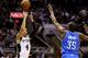 SAN ANTONIO, TX - MAY 21: Danny Green #4 of the San Antonio Spurs makes a three-pointer over Kevin Durant #35 of the Oklahoma City Thunder in the first half in Game Two of the Western Conference Finals during the 2014 NBA Playoffs at AT&T Center on May 2