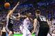 OKLAHOMA CITY, OK - MAY 27: Kevin Durant #35 of the Oklahoma City Thunder passes against Matt Bonner #15 and Aron Baynes #16 of the San Antonio Spurs in the third quarter during Game Four of the Western Conference Finals of the 2014 NBA Playoffs at Chesap