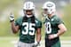 FLORHAM PARK, NJ - MAY 16: Safety's Calvin Pryor #35 and Chris Poston #40 of the New York Jets talk during the first day of rookie minicamp on May 16, 2014 in Florham Park, New Jersey. (Photo by Rich Schultz /Getty Images)