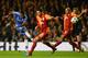 LONDON, ENGLAND - MARCH 18: Samuel Eto'o of Chelsea shoots past Hakan Balta (22) and Felipe Melo of Galatasaray during the UEFA Champions League Round of 16 second leg match between Chelsea and Galatasaray AS at Stamford Bridge on March 18, 2014 in Londo