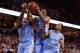 Jan 20, 2014; Charlottesville, VA, USA; North Carolina Tar Heels forward Kennedy Meeks (3), Tar Heels forward James Michael McAdoo (43), and Tar Heels forward Brice Johnson (11) reach for the ball against the Virginia Cavaliers at John Paul Jones Arena. M