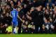 LONDON, ENGLAND - JANUARY 19: Jose Mourinho the Chelsea manager speaks with Oscar of Chelsea during the Barclays Premier League match between Chelsea and Manchester United at Stamford Bridge on January 19, 2014 in London, England. (Photo by Shaun Botter