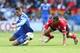 CARDIFF, WALES - MAY 11: Fernando Torres of Chelsea is challenged by Steven Caulker (R) during the Barclays Premier League match between Cardiff City and Chelsea at the Cardiff City Stadium on May 11, 2014 in Cardiff, Wales. (Photo by David Rogers/Getty