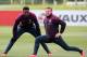 BURTON-UPON-TRENT, ENGLAND - MAY 27: Danny Welbeck and Wayne Rooney warm up during a training session at St Georges Park on May 27, 2014 in Burton-upon-Trent, England. (Photo by Jan Kruger/Getty Images)