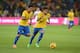 JOHANNESBURG, SOUTH AFRICA - MARCH 05: Paulinho and Neymar of Brazil in action during the International Friendly match between South Africa and Brazil at FNB Stadium on March 05, 2014 in Johannesburg, South Africa. (Photo by Lefty Shivambu/Gallo Images/G