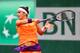 PARIS, FRANCE - MAY 26: Paula Ormaechea of Argentina returns a shot in her women's singles match against Romina Oprandi of Switzerland on day two of the French Open at Roland Garros on May 26, 2014 in Paris, France. (Photo by Clive Brunskill/Getty Image