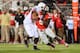 COLUMBUS, OH - OCTOBER 26: Noah Spence #8 of the Ohio State Buckeyes rushes against the Penn State Nittany Lions at Ohio Stadium on October 26, 2013 in Columbus, Ohio. (Photo by Jamie Sabau/Getty Images)