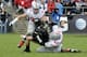 Nov 2, 2013; West Lafayette, IN, USA; Purdue Boilermakers quarterback Danny Etling (5) is sacked by Ohio State Buckeyes defensive lineman Michael Bennett (63) and defensive lineman Joey Bosa (97) in the first half at Ross Ade Stadium. Mandatory Credit: S