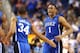 GREENSBORO, NC - MARCH 16: Jabari Parker #1 of the Duke Blue Devils is congratulated by Andre Dawkins #34 of the Duke Blue Devils during their game against the Virginia Cavaliers in the finals of the 2014 Men's ACC Basketball Tournament at Greensboro Col