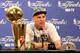 MIAMI, FL - JUNE 12: Jason Kidd #2 of the Dallas Mavericks answers questions from the media as the Larry O'Brien Championship trophy sits on the table during a post game news conference after the Mavericks won 105-95 against the Miami Heat in Game Six of