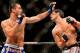 Feb 15, 2014; Jaragua do Sul, SC, Brazil; Lyoto Machida (red gloves) fights against Gegard Mousasi (blue gloves) during UFC Fight Night Machida vs Mousasi at Arena Jaragua. Mandatory Credit: Jason Silva-USA TODAY Sports