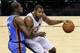 SAN ANTONIO, TX - MAY 21: Boris Diaw #33 of the San Antonio Spurs posts up Kevin Durant #35 of the Oklahoma City Thunder in the first half in Game Two of the Western Conference Finals during the 2014 NBA Playoffs at AT&T Center on May 21, 2014 in San Ant