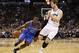 May 29, 2014; San Antonio, TX, USA; Oklahoma City Thunder guard Reggie Jackson (15) dribbles past San Antonio Spurs center Tiago Splitter (22) during the first half in game five of the Western Conference Finals of the 2014 NBA Playoffs at AT&T Center. Man