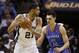 May 29, 2014; San Antonio, TX, USA; San Antonio Spurs forward Tim Duncan (21) looks to drive as Oklahoma City Thunder center Steven Adams (12) defends during the first half in game five of the Western Conference Finals of the 2014 NBA Playoffs at AT&T Cen