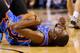 SAN ANTONIO, TX - MAY 29: Kevin Durant #35 of the Oklahoma City Thunder lies on the court after a collision in the second half against the San Antonio Spurs during Game Five of the Western Conference Finals of the 2014 NBA Playoffs at AT&T Center on May 2
