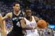 May 27, 2014; Oklahoma City, OK, USA; Oklahoma City Thunder guard Reggie Jackson (15) drives to the basket against San Antonio Spurs guard Danny Green (4) during the first quarter in game four of the Western Conference Finals of the 2014 NBA Playoffs at C