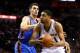 SAN ANTONIO, TX - MAY 29: Tim Duncan #21 of the San Antonio Spurs drives to the basket against Steven Adams #12 of the Oklahoma City Thunder in the second quarter during Game Five of the Western Conference Finals of the 2014 NBA Playoffs at AT&T Center on