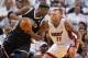 May 6, 2014; Miami, FL, USA; Brooklyn Nets center Andray Blatche (0) drives to the basket as Miami Heat forward Chris Andersen (11) defends during the first half in game one of the second round of the 2014 NBA Playoffs at American Airlines Arena. Mandator