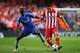LONDON, ENGLAND - APRIL 30: Koke of Club Atletico de Madrid is tackled by Ramires of Chelsea during the UEFA Champions League semi-final second leg match between Chelsea and Club Atletico de Madrid at Stamford Bridge on April 30, 2014 in London, England.
