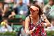 PARIS, FRANCE - MAY 30: Agnieszka Radwanska of Poland returns a shot during her women's singles match against Ajla Tomljanovic of Croatia on day six of the French Open at Roland Garros on May 30, 2014 in Paris, France. (Photo by Matthew Stockman/Getty I