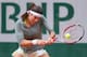 PARIS, FRANCE - MAY 28: Ajla Tomljanovic of Croatia returns a shot during her women's singles match against Elena Vesnina of Russia on day four of the French Open at Roland Garros on May 28, 2014 in Paris, France. (Photo by Clive Brunskill/Getty Images)