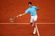PARIS, FRANCE - MAY 30: Novak Djokovic of Serbia returns a shot during his men's singles match against Marin Cilic of Croatia on day six of the French Open at Roland Garros on May 30, 2014 in Paris, France. (Photo by Clive Brunskill/Getty Images)