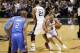 May 21, 2014; San Antonio, TX, USA; San Antonio Spurs forward Tim Duncan (21) sets a pick for guard Tony Parker (9) against Oklahoma City Thunder guard Russell Westbrook (behind) in game two of the Western Conference Finals of the 2014 NBA Playoffs at AT&