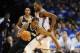 May 27, 2014; Oklahoma City, OK, USA; San Antonio Spurs forward Kawhi Leonard (2) handles the ball against Oklahoma City Thunder forward Kevin Durant (35) during the second quarter in game four of the Western Conference Finals of the 2014 NBA Playoffs at