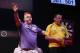 DUBAI, UNITED ARAB EMIRATES - MAY 30: Peter Wright of England celebrates after defeating Dave Chisnall of England during the 2014 Dubai Duty Free Darts Masters Semi-Final match at Dubai Duty Free Tennis Stadium, Irish Village on May 30, 2014 in Dubai, Un