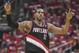 Apr 20, 2014; Houston, TX, USA; Portland Trail Blazers forward LaMarcus Aldridge (12) celebrates after scoring during the first quarter against the Houston Rockets in game one during the first round of the 2014 NBA Playoffs at Toyota Center. Mandatory Cre