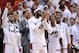 May 30, 2014; Miami, FL, USA; Miami Heat forward LeBron James (middle) leads teammates in celebration from the bench during the second half in game six of the Eastern Conference Finals of the 2014 NBA Playoffs against the Indiana Pacers at American Airlin