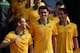 SYDNEY, AUSTRALIA - MAY 23: (L-R) Oliver Bozanic, Tom Rogic and Mark Milligan walk out for the team photo during the Australian Socceroos World Cup Squad official team photo session at WIN Jubilee Stadium on May 23, 2014 in Sydney, Australia. (Photo by