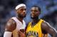 May 30, 2014; Miami, FL, USA; Miami Heat forward LeBron James (left) stands next to Indiana Pacers guard Lance Stephenson (right) during the first half in game six of the Eastern Conference Finals of the 2014 NBA Playoffs at American Airlines Arena. Manda