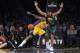 Feb 21, 2014; Los Angeles, CA, USA; Los Angeles Lakers center Jordan Hill (27) loses control of the ball in front of Boston Celtics forward Kris Humphries (43) during the second quarter at Staples Center. Mandatory Credit: Kelvin Kuo-USA TODAY Sports