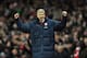 LONDON, ENGLAND - DECEMBER 10: Manager Arsene Wenger of Arsenal celebrates as Robin van Persie of Arsenal scores the opening goal during the Barclays Premier League match between Arsenal and Everton at Emirates Stadium on December 10, 2011 in London, Eng